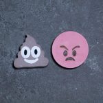 poop and angry emoji chalk